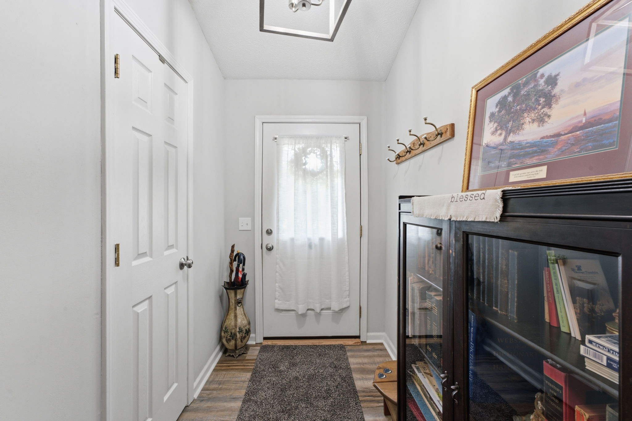 255 St Mary's Road Buffalo Valley, TN 38548 - Photo 8 of 36 a view of a hallway with paintings on the wall