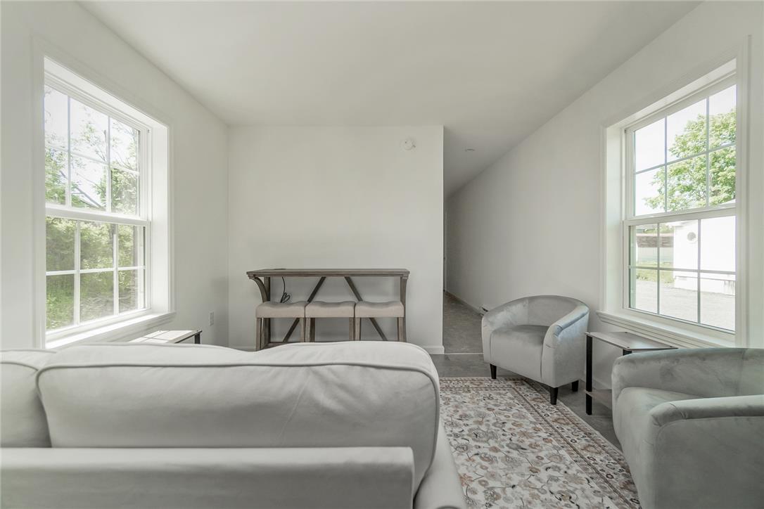 624 Main Road Lehighton, PA 18235 - Photo 13 of 42 A luminous living space features generous windows and a wide, open layout.
