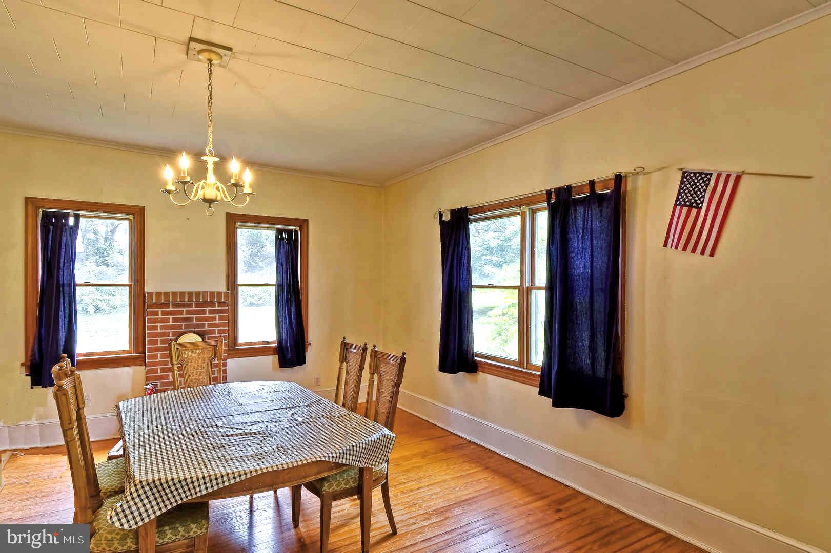 409 Cohansey Friesburg Road Alloway, NJ 08318 - Photo 11 of 25 Formal Dining room with built-in corner hutch