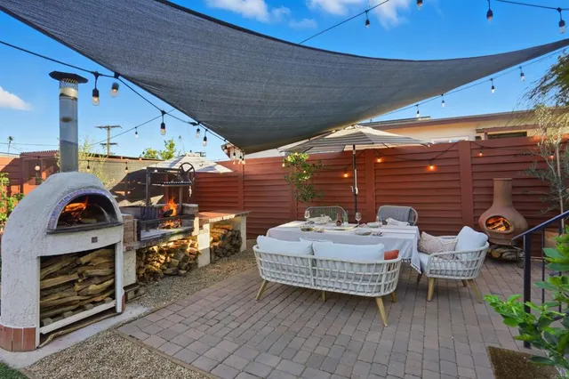 a view of a chairs and tables in patio
