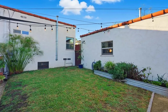 a view of a back yard of the house