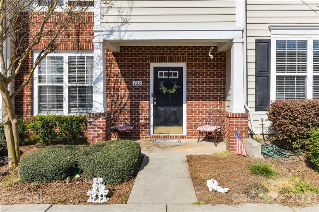 732 Shellstone Place, Unit 732 Fort Mill, SC 29708 - Photo 3 of 28 a front view of a house with a garden