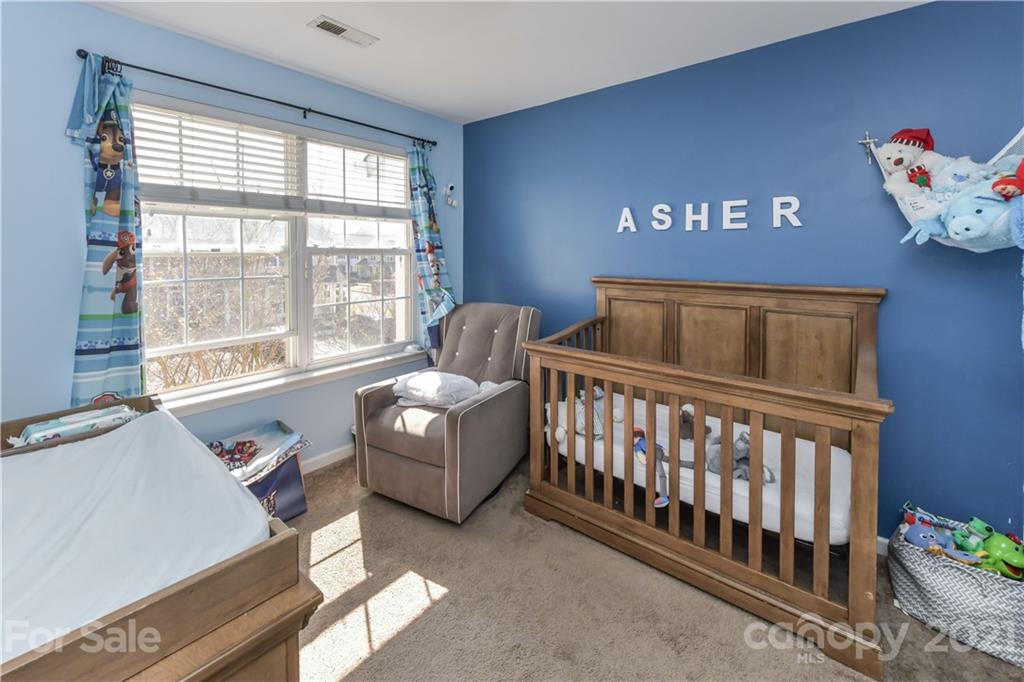 732 Shellstone Place, Unit 732 Fort Mill, SC 29708 - Photo 24 of 28 a bedroom with furniture and a window