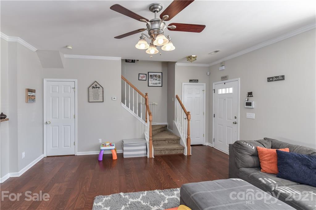 732 Shellstone Place, Unit 732 Fort Mill, SC 29708 - Photo 7 of 28 a living room with furniture and wooden floor