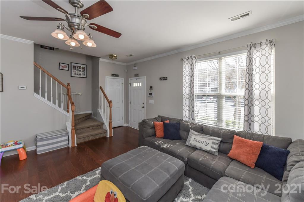 732 Shellstone Place, Unit 732 Fort Mill, SC 29708 - Photo 8 of 28 a living room with furniture and wooden floor
