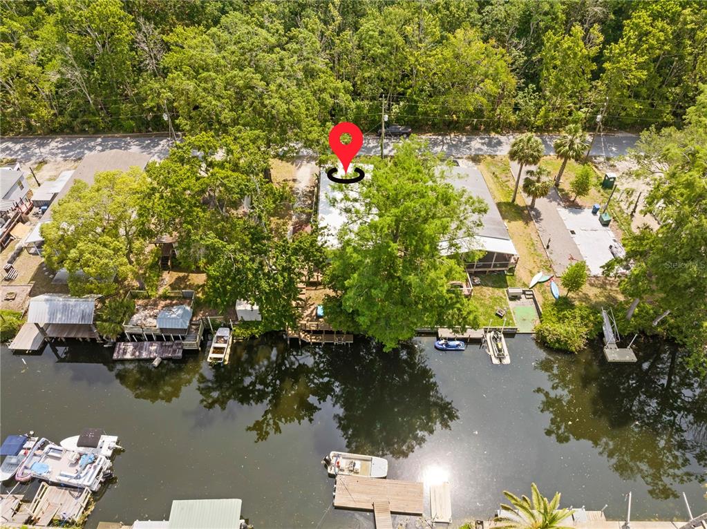 6380 Richard Drive Weeki Wachee, FL 34607 - Photo 18 of 59 an aerial view of residential houses with outdoor space and lake view
