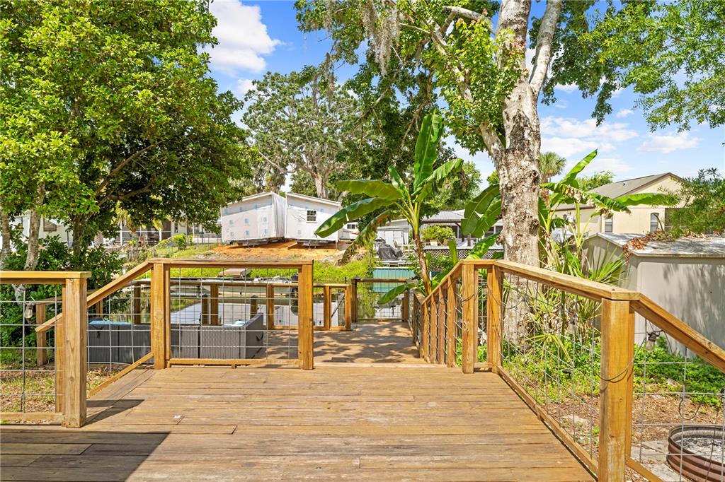 6380 Richard Drive Weeki Wachee, FL 34607 - Photo 22 of 59 a view of a balcony with staircase