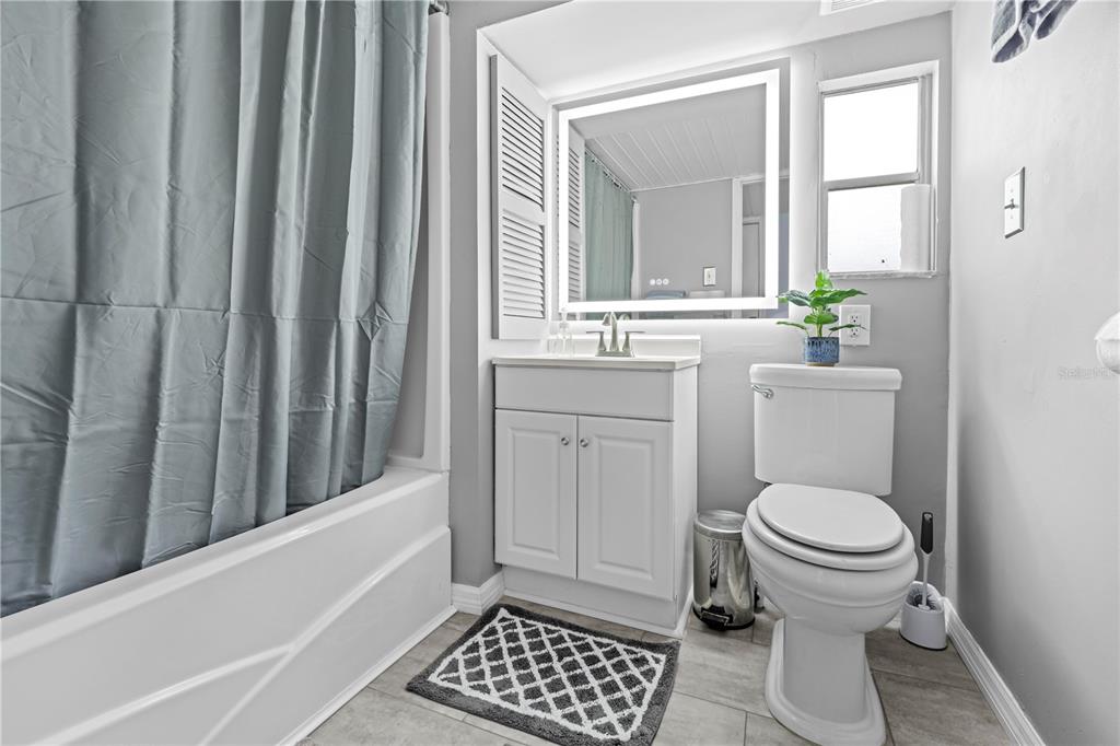 6380 Richard Drive Weeki Wachee, FL 34607 - Photo 35 of 59 a bathroom with a toilet and a sink