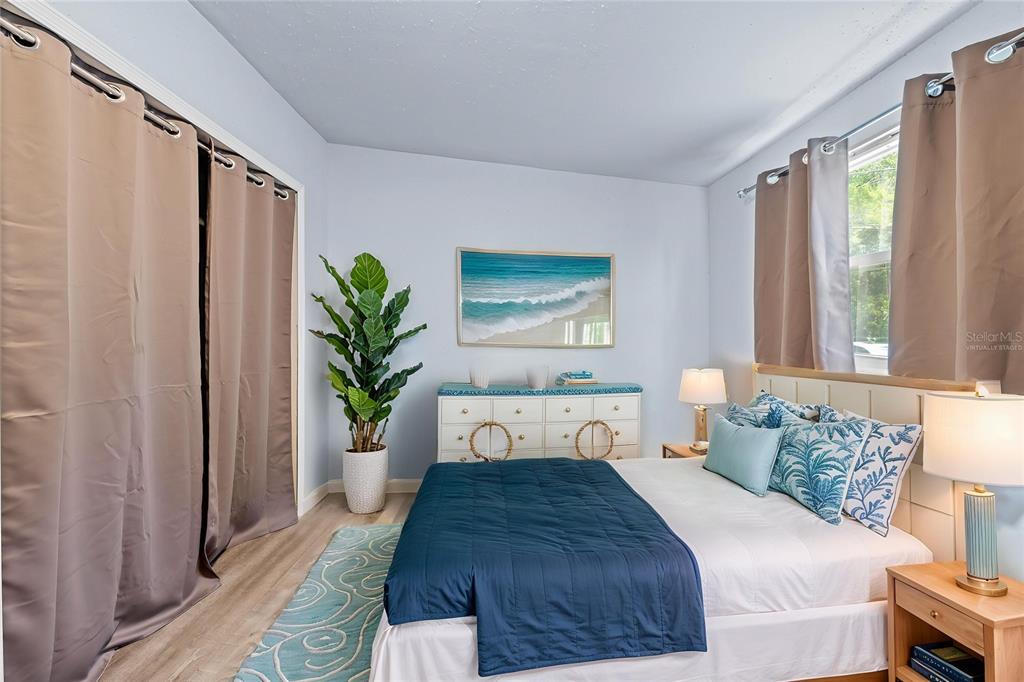 6380 Richard Drive Weeki Wachee, FL 34607 - Photo 40 of 59 a bedroom with a bed running cycle and a window