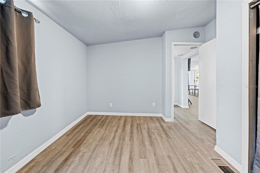6380 Richard Drive Weeki Wachee, FL 34607 - Photo 42 of 59 a view of a room with wooden floor and a sink