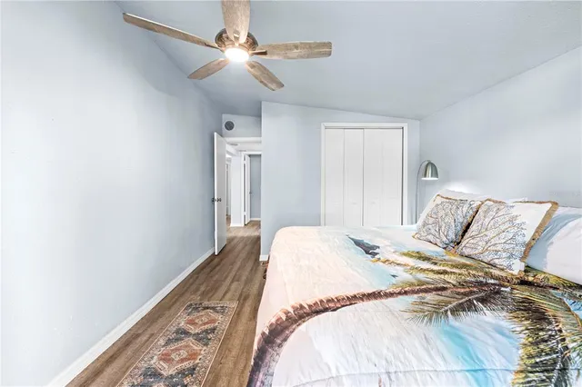 a view of entryway with wooden floor and a potted plant