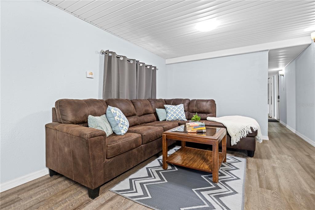 6380 Richard Drive Weeki Wachee, FL 34607 - Photo 53 of 59 a bedroom with furniture and a couch