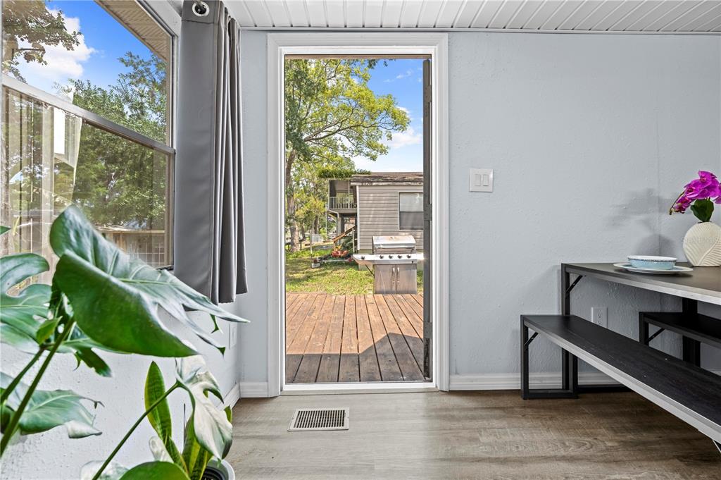 6380 Richard Drive Weeki Wachee, FL 34607 - Photo 59 of 59 a view of entryway with wooden floor and a potted plant
