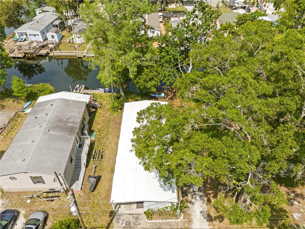 6380 Richard Drive Weeki Wachee, FL 34607 - Photo 8 of 59 an aerial view of residential house with outdoor space and trees around