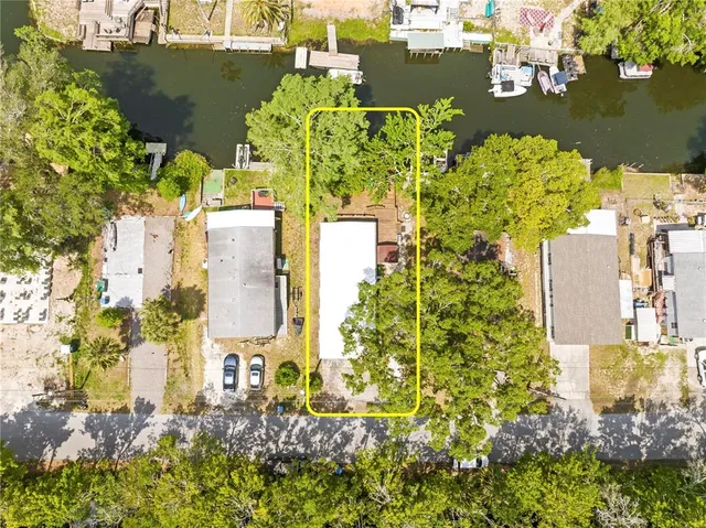 aerial view of a residential houses with swimming pool