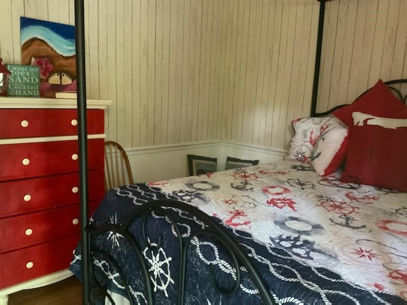 516 Highway 9 Marmora, NJ 08223 - Photo 11 of 14 a bedroom with a bed and a window