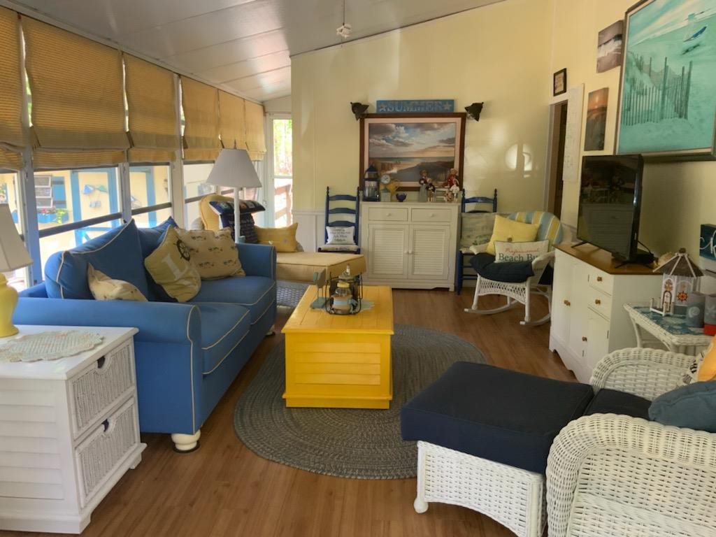 516 Highway 9 Marmora, NJ 08223 - Photo 14 of 14 a living room with furniture and a flat screen tv