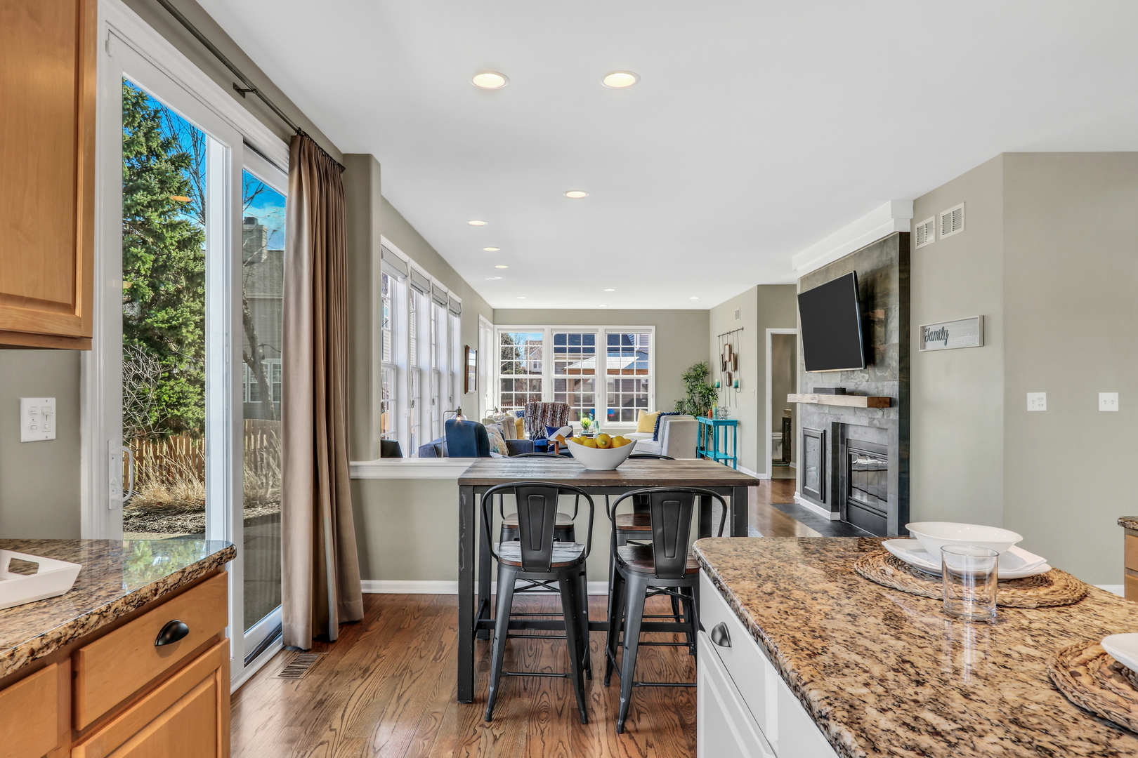 1135 Hadley Circle Gurnee, IL 60031 - Photo 17 of 60 a view of a dining room with furniture window and wooden floor