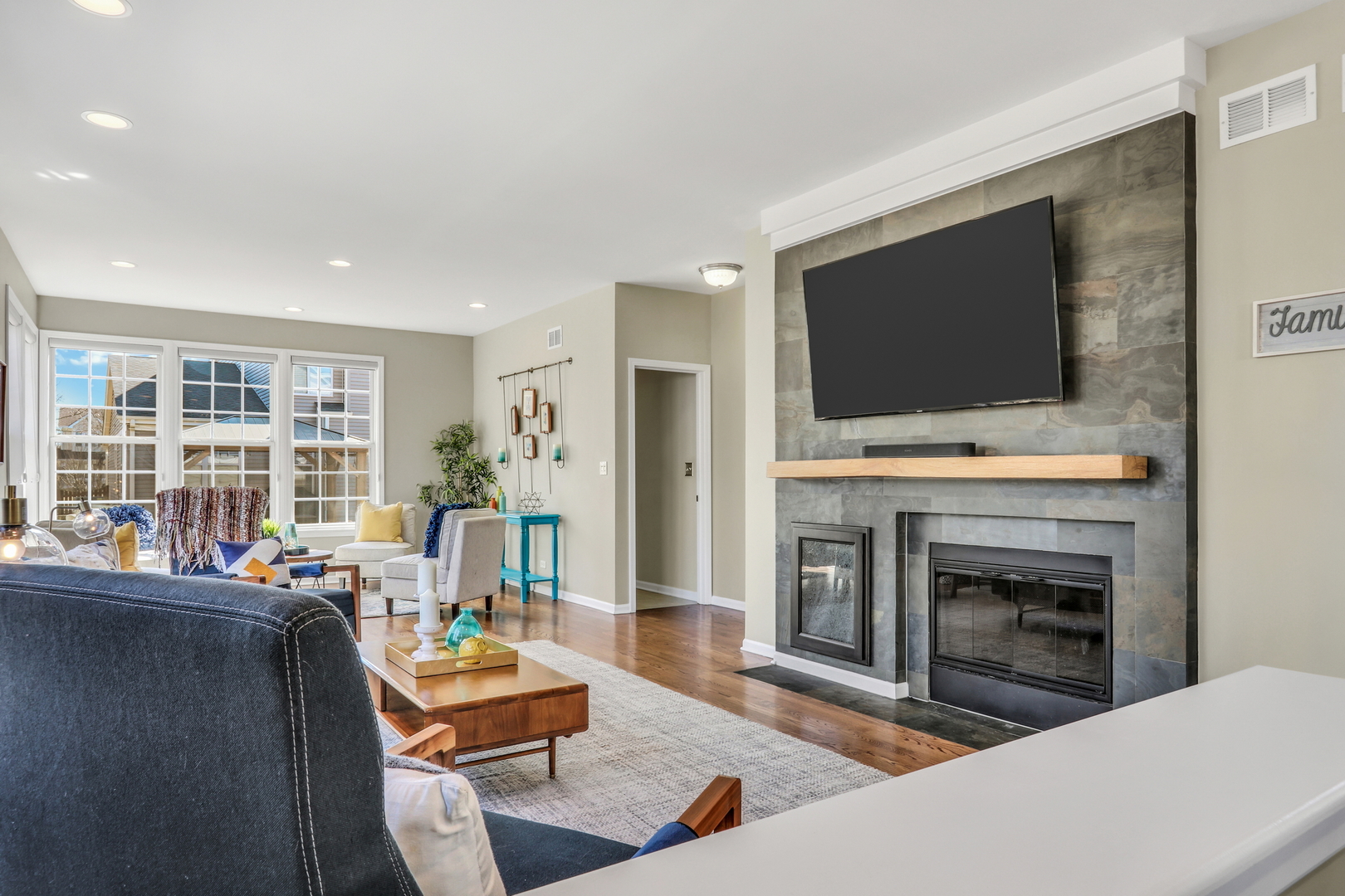 1135 Hadley Circle Gurnee, IL 60031 - Photo 19 of 60 a living room with furniture and a flat screen tv