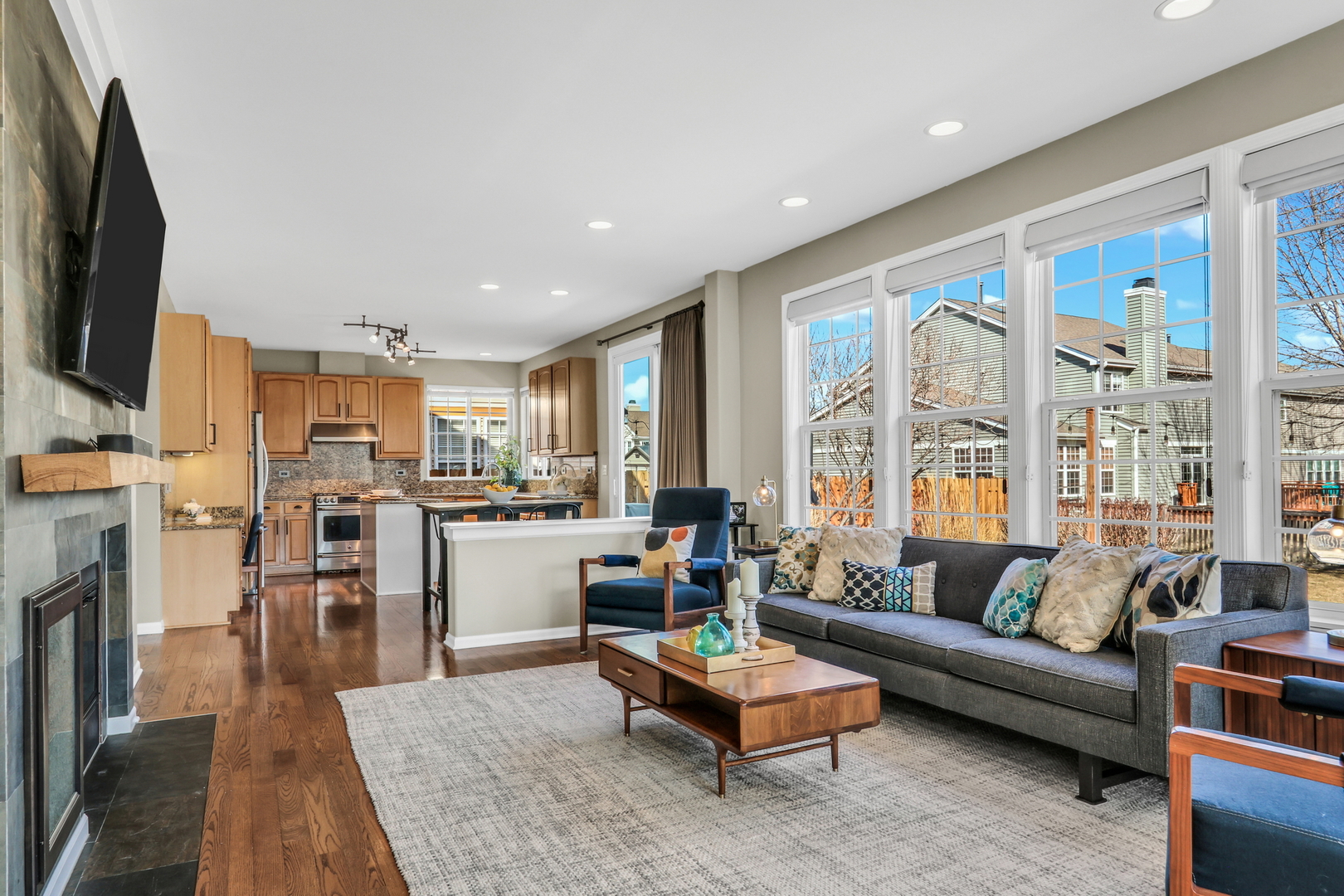 1135 Hadley Circle Gurnee, IL 60031 - Photo 21 of 60 a living room with fireplace furniture and a flat screen tv