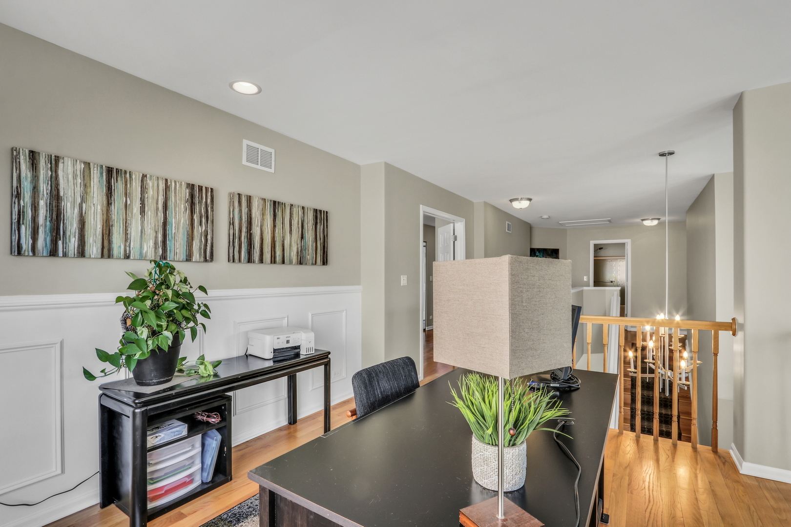 1135 Hadley Circle Gurnee, IL 60031 - Photo 31 of 60 a living room with furniture potted plant and a wooden floor