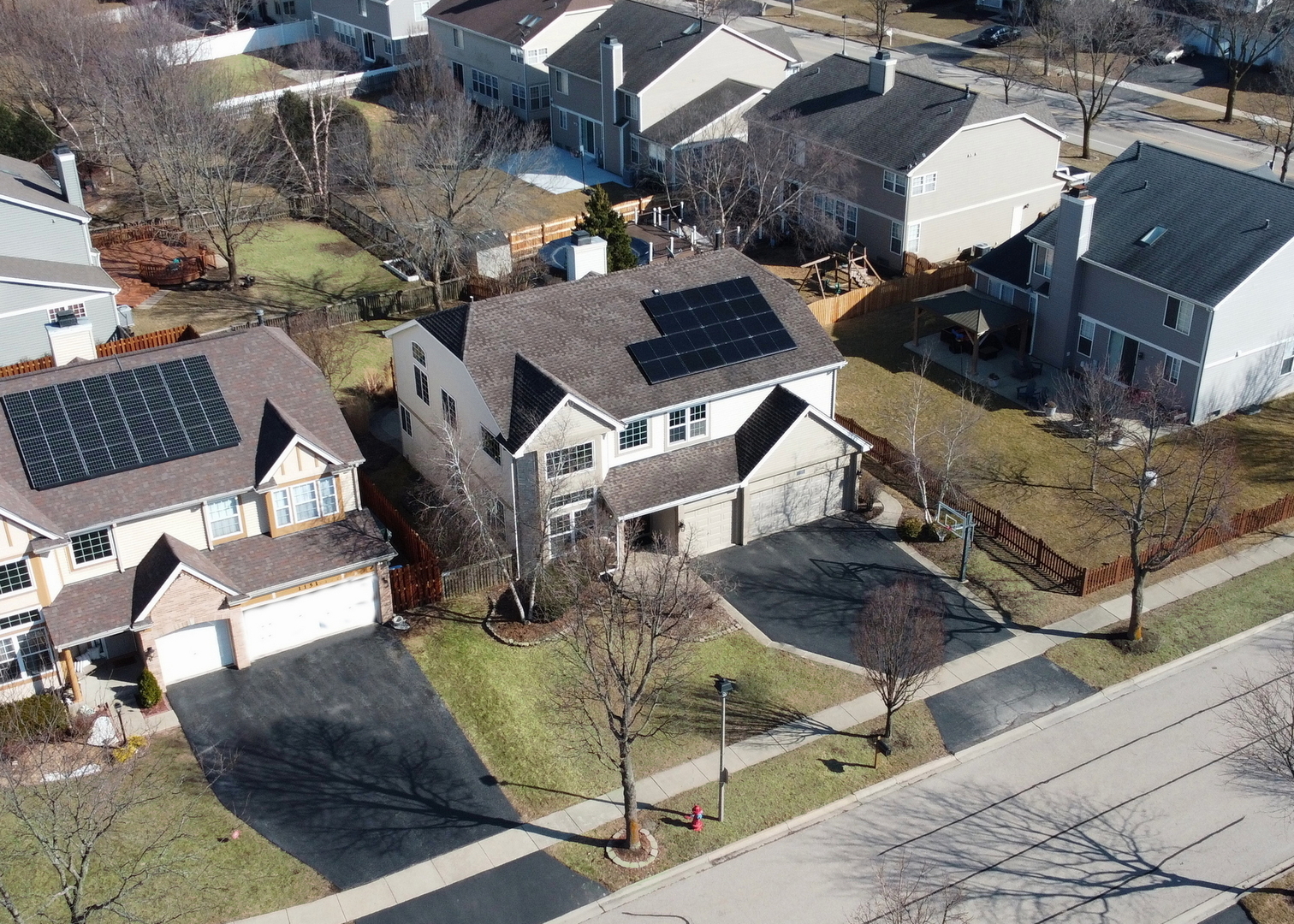 1135 Hadley Circle Gurnee, IL 60031 - Photo 59 of 60 an aerial view of a house with large trees