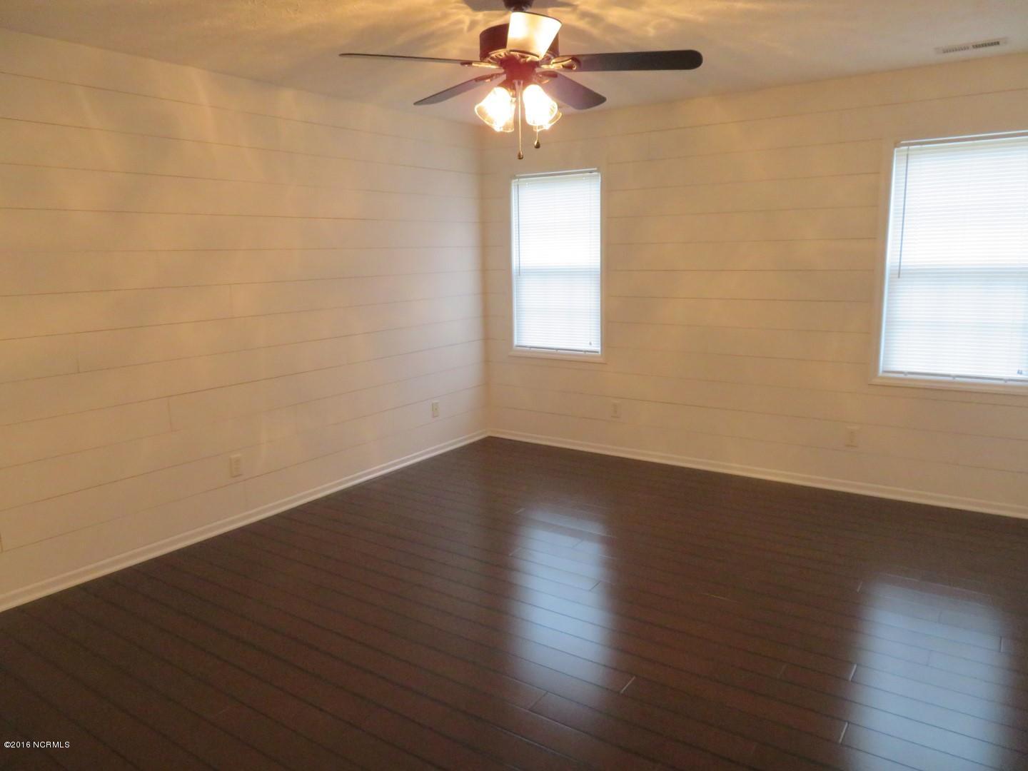 103 Conner Grant Road New Bern, NC 28562 - Photo 14 of 41 Master Bedroom With Ship Lap