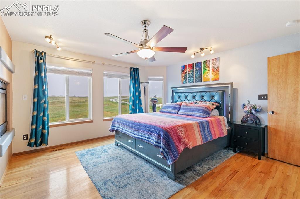 11960 Conestoga Trail South Elbert, CO 80106 - Photo 23 of 49 a bedroom with a bed dresser and a window