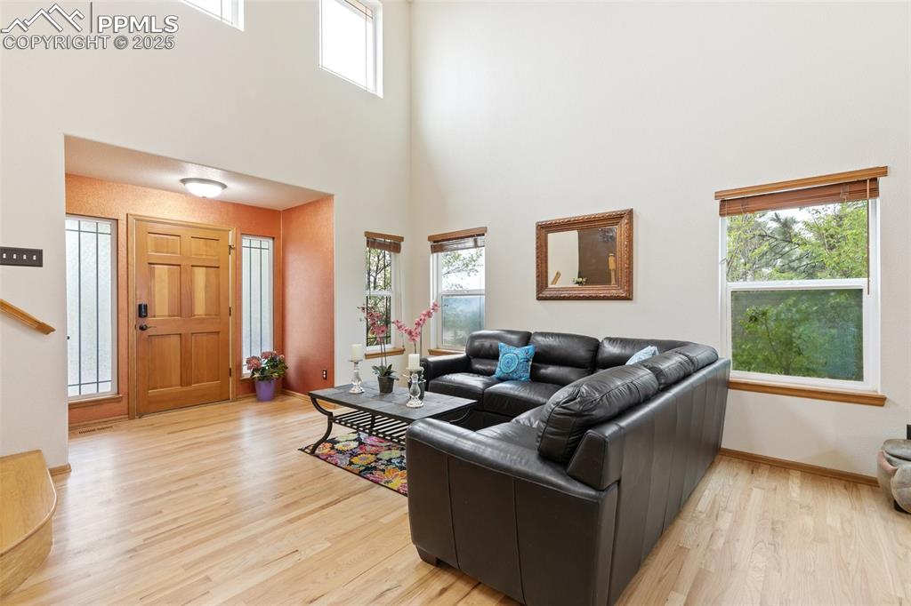 11960 Conestoga Trail South Elbert, CO 80106 - Photo 6 of 49 a living room with furniture and a window
