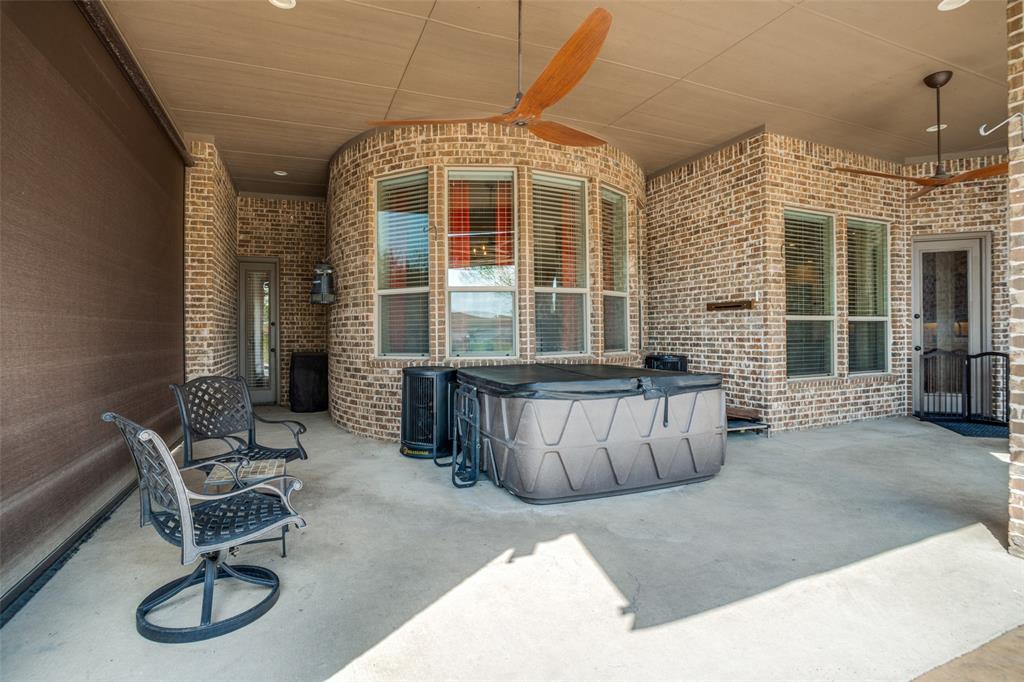 1929 Canyon Road Celina, TX 75009 - Photo 26 of 39 View of patio / terrace featuring a ceiling fan and a hot tub