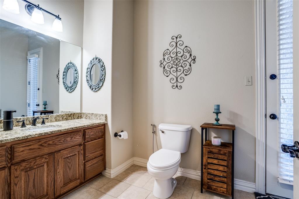 1929 Canyon Road Celina, TX 75009 - Photo 28 of 39 Bathroom with vanity and light tile patterned floors