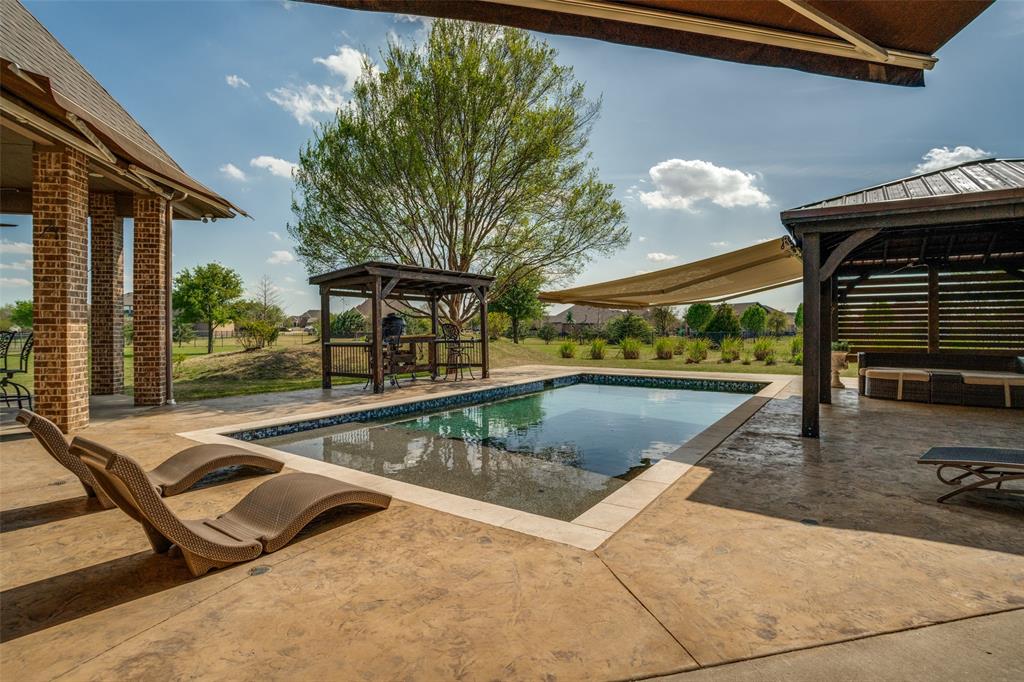 1929 Canyon Road Celina, TX 75009 - Photo 30 of 39 Swimming pool with a gazebo and a patio area