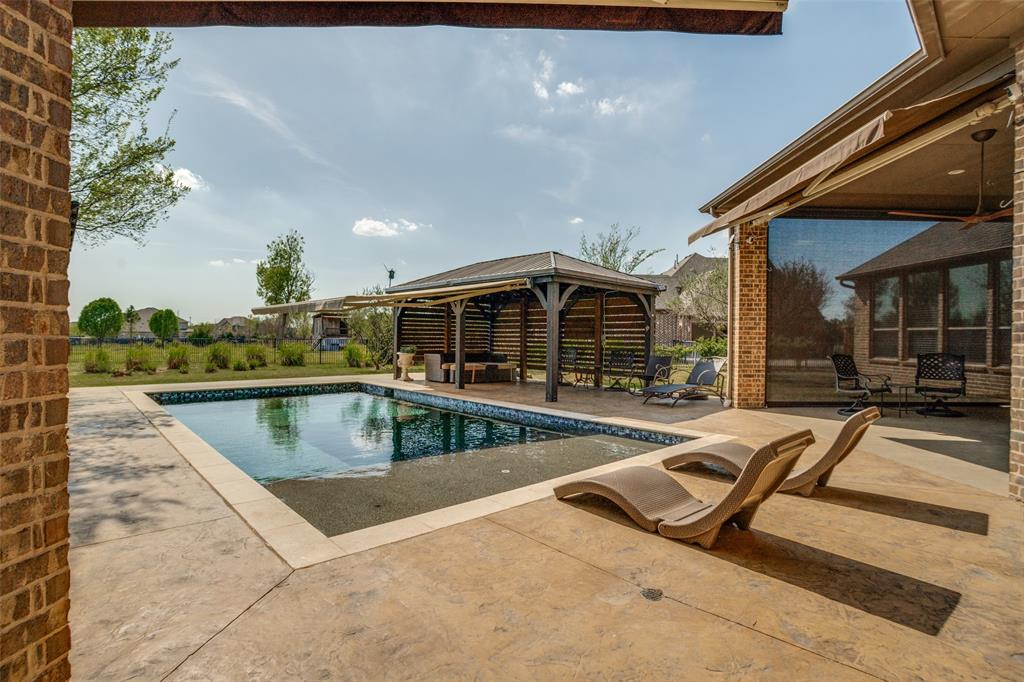1929 Canyon Road Celina, TX 75009 - Photo 31 of 39 Outdoor pool featuring a gazebo and a patio