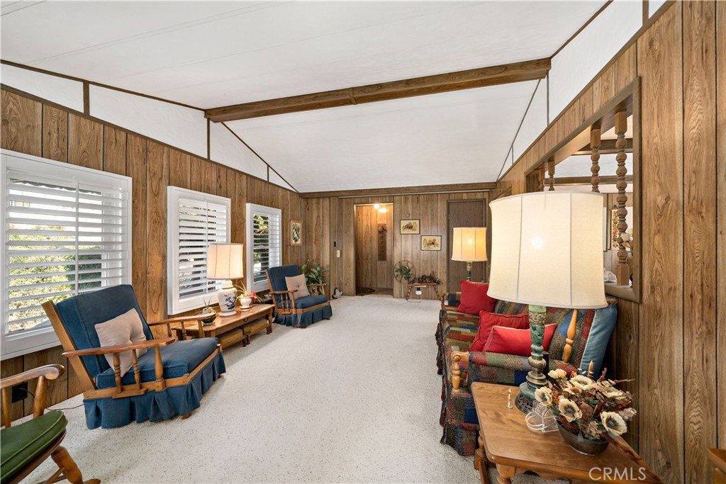 33950 Plowshare Road Wildomar, CA 92595 - Photo 19 of 62 a living room with furniture and large windows