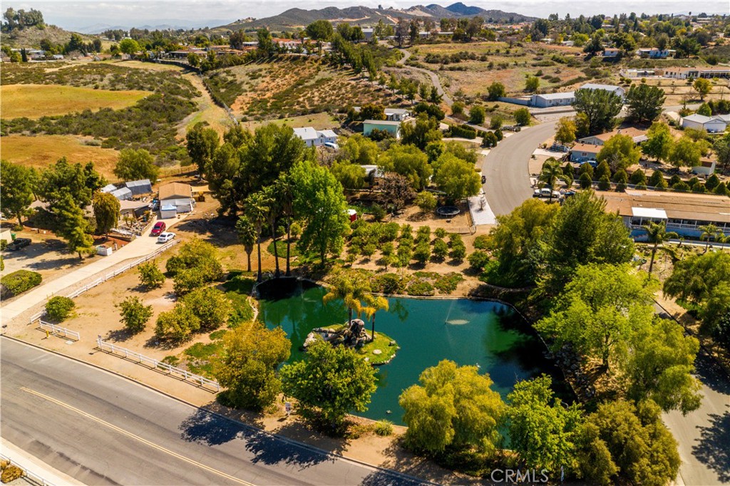 33950 Plowshare Road Wildomar, CA 92595 - Photo 46 of 62 an aerial view of lake residential house with swimming pool and ocean view