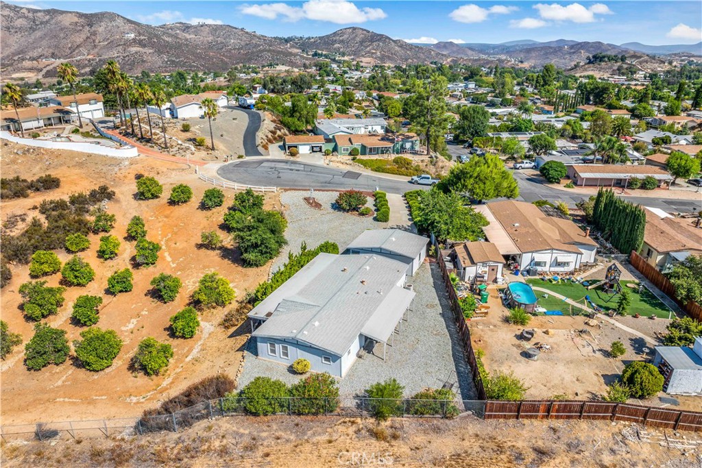 33950 Plowshare Road Wildomar, CA 92595 - Photo 9 of 62 an aerial view of residential houses with outdoor space and parking