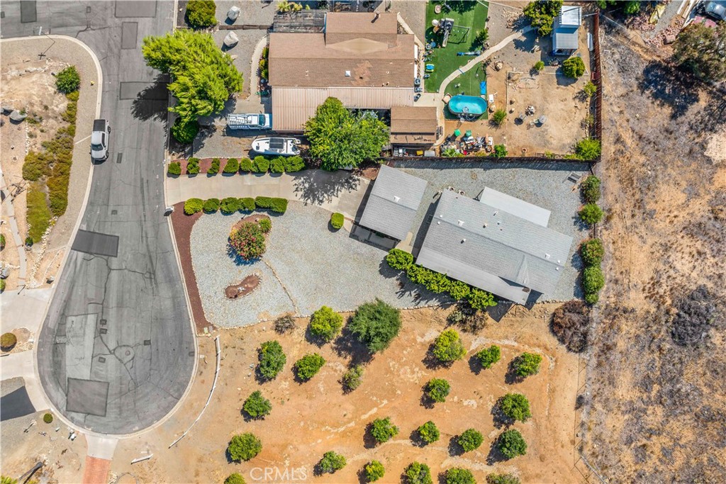 33950 Plowshare Road Wildomar, CA 92595 - Photo 10 of 62 an aerial view of a house with a swimming pool