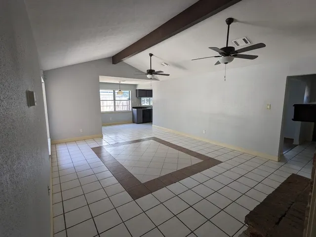 a view of a livingroom with a furniture and window