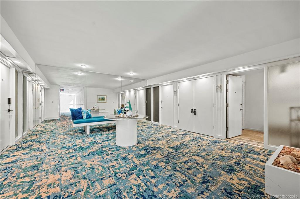 669 Northeast Plantation Road, Unit 405 Stuart, FL 34996 - Photo 11 of 34 a view of a living room and dining room