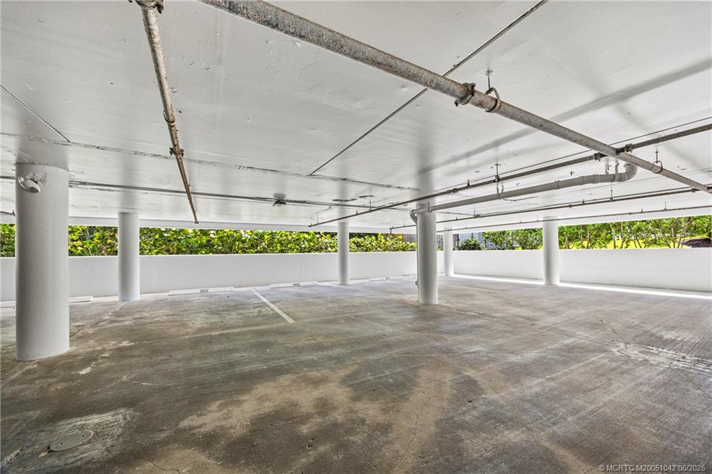 669 Northeast Plantation Road, Unit 405 Stuart, FL 34996 - Photo 32 of 34 a view of a garage