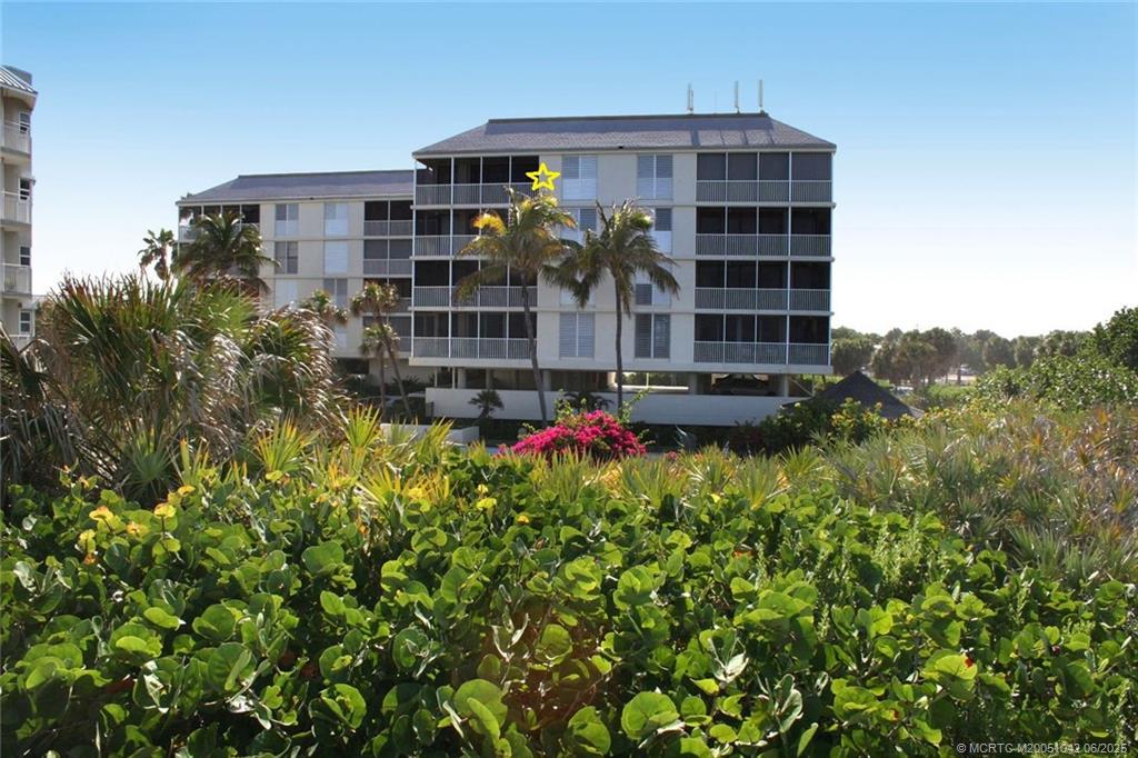 669 Northeast Plantation Road, Unit 405 Stuart, FL 34996 - Photo 7 of 34 a front view of a building