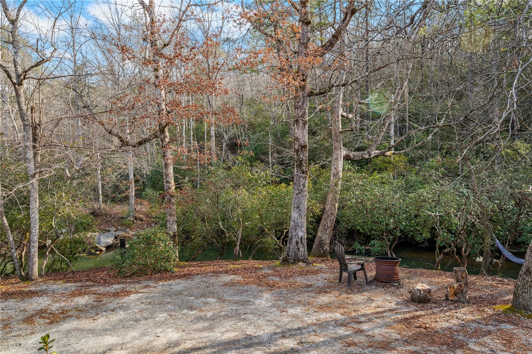 260 Hickory Ridge Mountain Rest, SC 29664 - Photo 28 of 39 This serene outdoor space features a tranquil waterfront setting surrounded by nature's beauty.