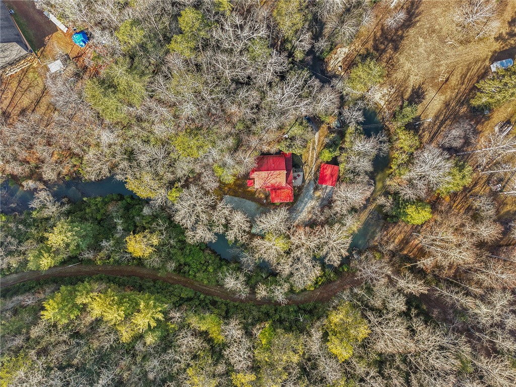 260 Hickory Ridge Mountain Rest, SC 29664 - Photo 35 of 39 This unique property offers a serene setting amidst a natural landscape with a tranquil river.
