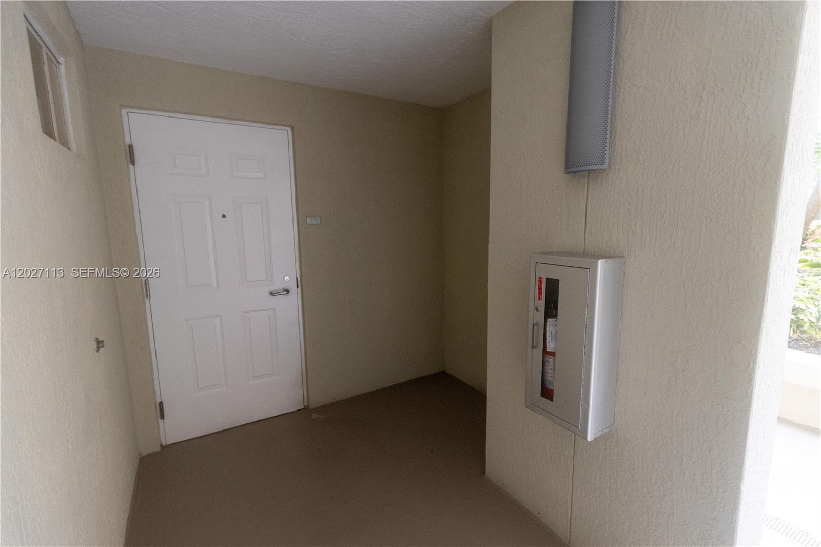 7275 Southwest 90th Way, Unit 213 Miami, FL 33156 - Photo 6 of 31 a view of a room with an empty space