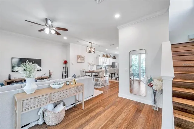 a very nice looking living room with a large window