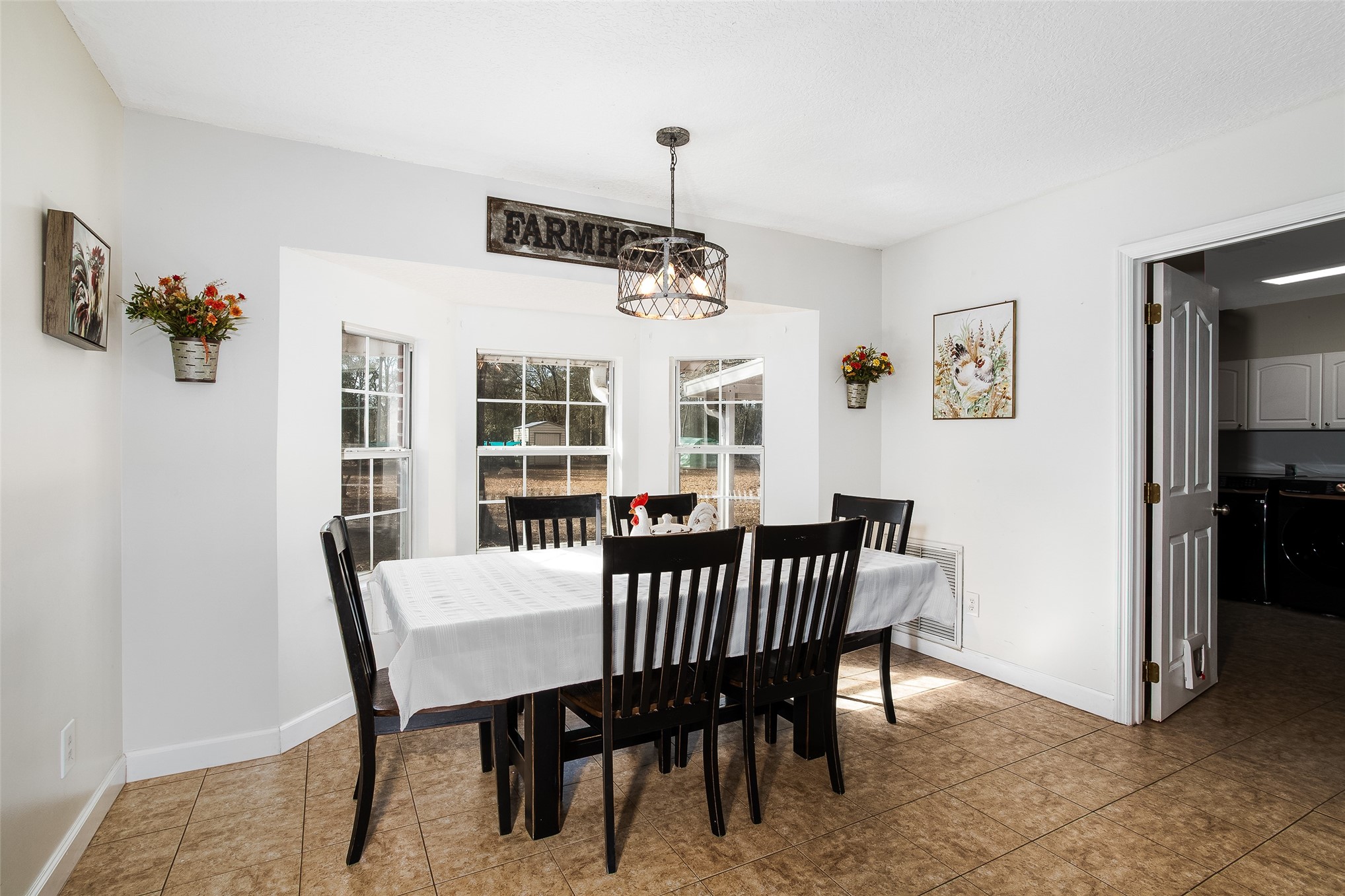 17098 Cross Branch Road Hilliard, FL 32046 - Photo 15 of 71 a view of a dining room with furniture