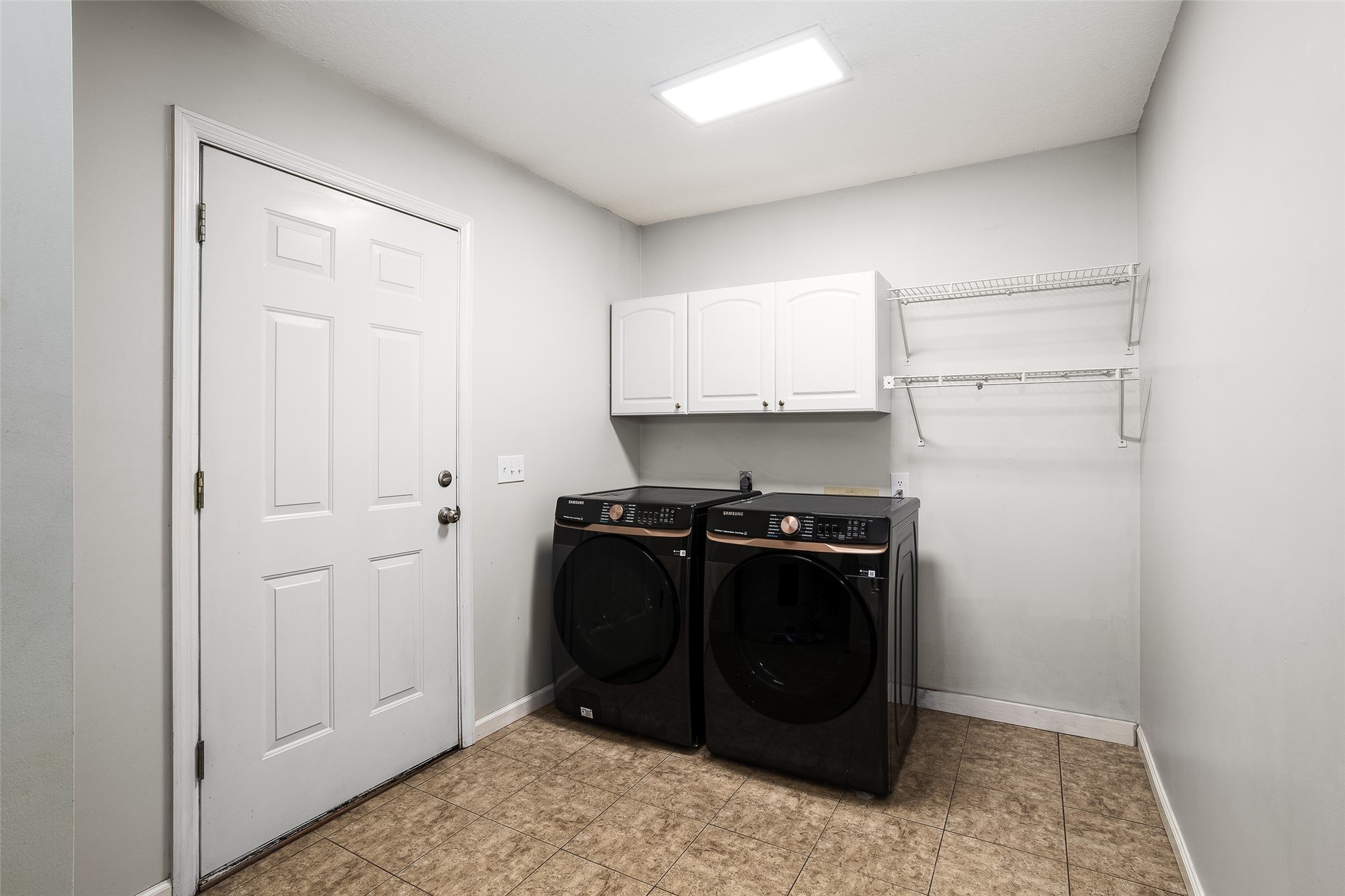 17098 Cross Branch Road Hilliard, FL 32046 - Photo 19 of 48 Laundry Room with Door to Back Patio