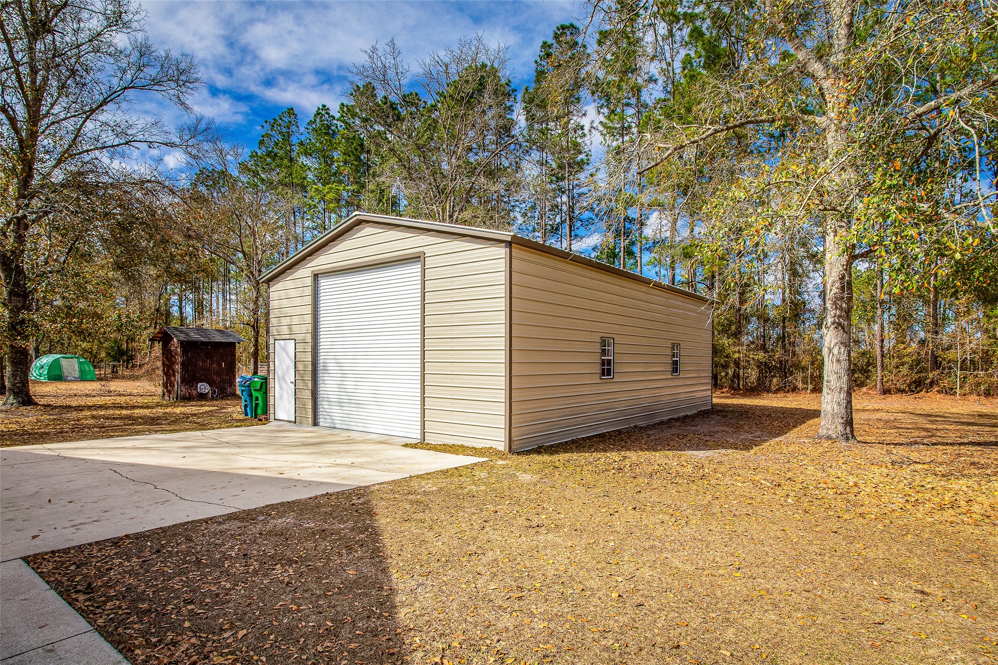 17098 Cross Branch Road Hilliard, FL 32046 - Photo 2 of 48 40x26x12 WORKSHOP with 12' Dual Roll up Doors