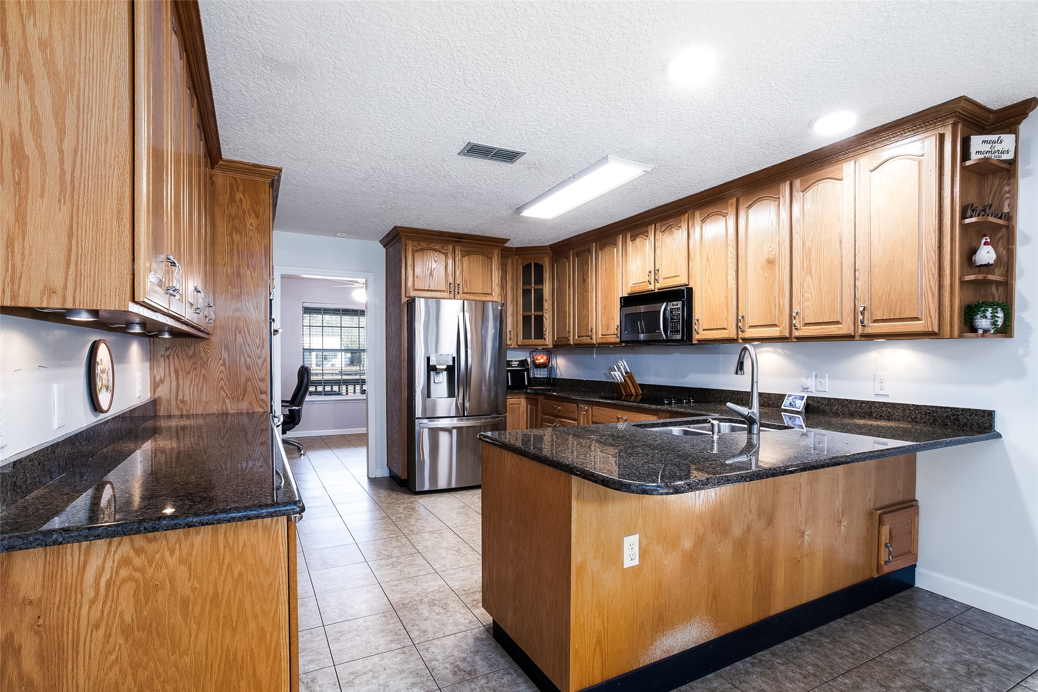 17098 Cross Branch Road Hilliard, FL 32046 - Photo 3 of 48 Granite Countertops with Breakfast Bar