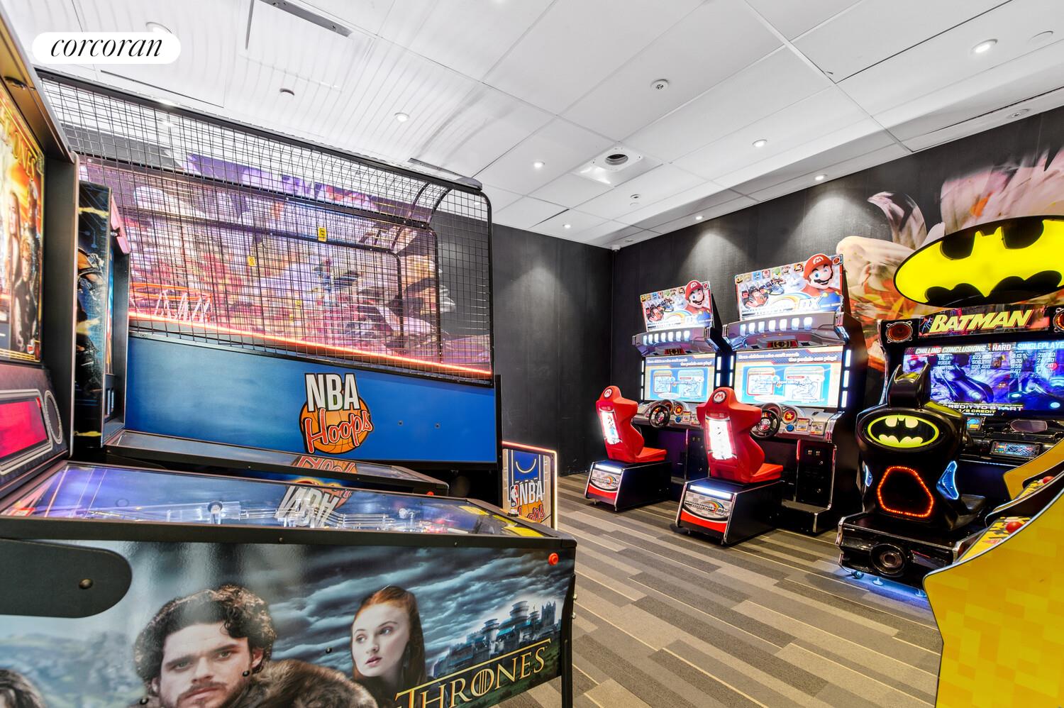 54 Noll Street, Unit 715 Brooklyn, NY 11206 - Photo 25 of 28 a room with stainless steel appliances kitchen island granite countertop furniture and a flat screen tv